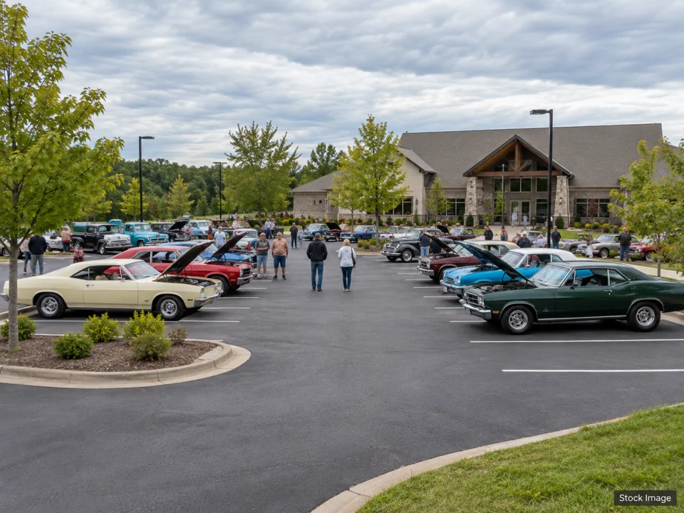 Car Shows & Cruise-Ins — a wide classic-car gathering in a parking lot scene